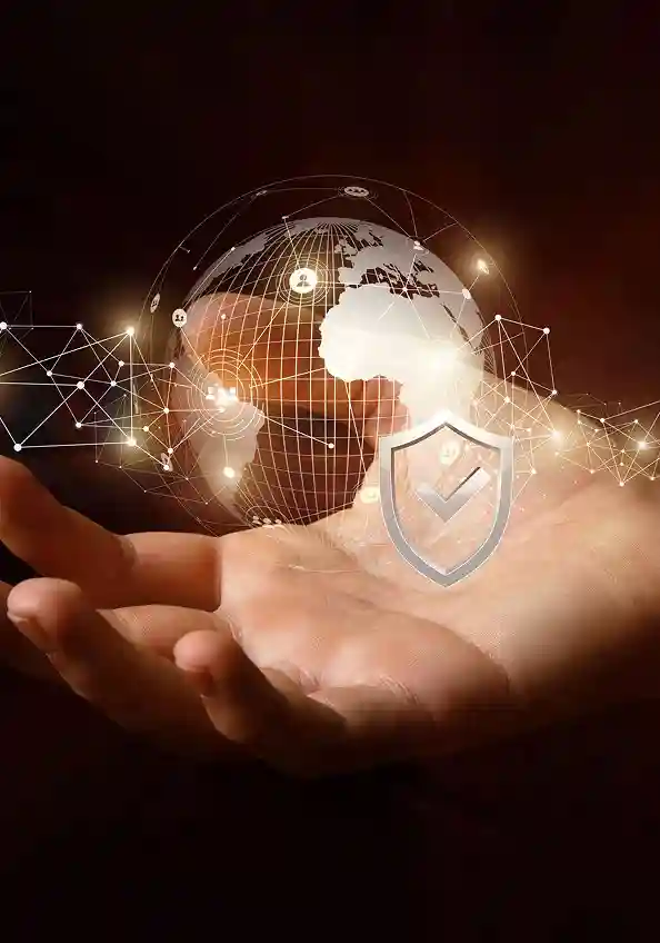 Hand holding digital globe with security shield representing product safety and quality standards.